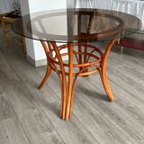 Table à manger verre fumé et rotin