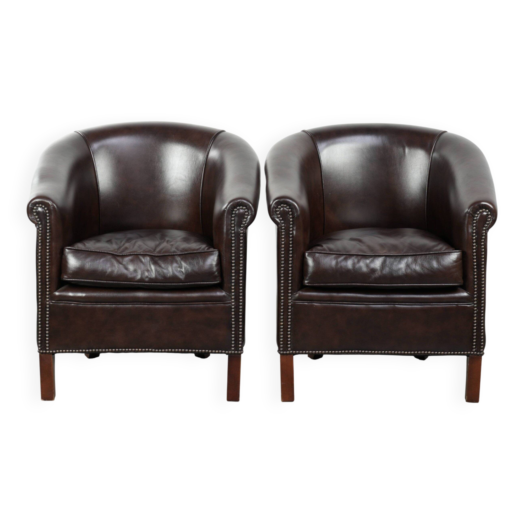 Set of two cowhide club armchairs in good condition with a English design