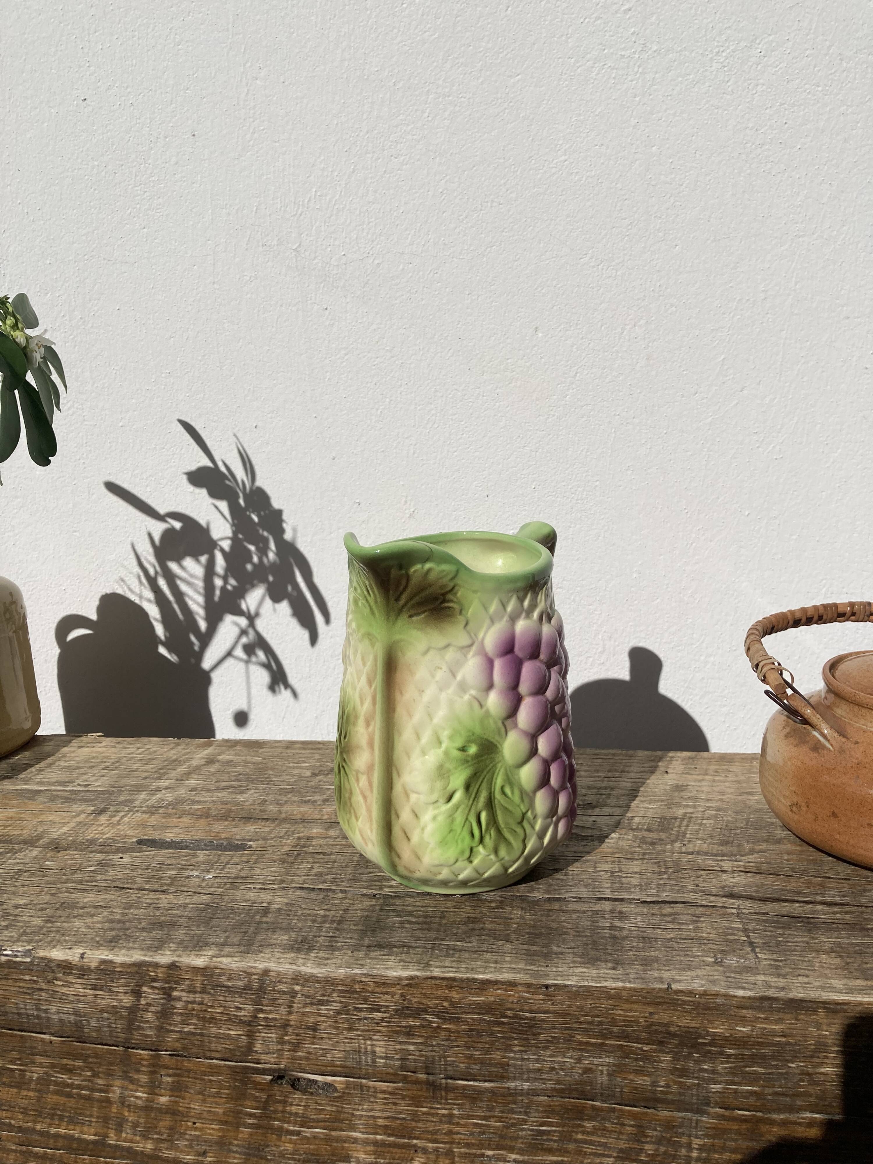 Pitcher in slip - earthenware Saint Clement numbered with fruit and grape basket decoration