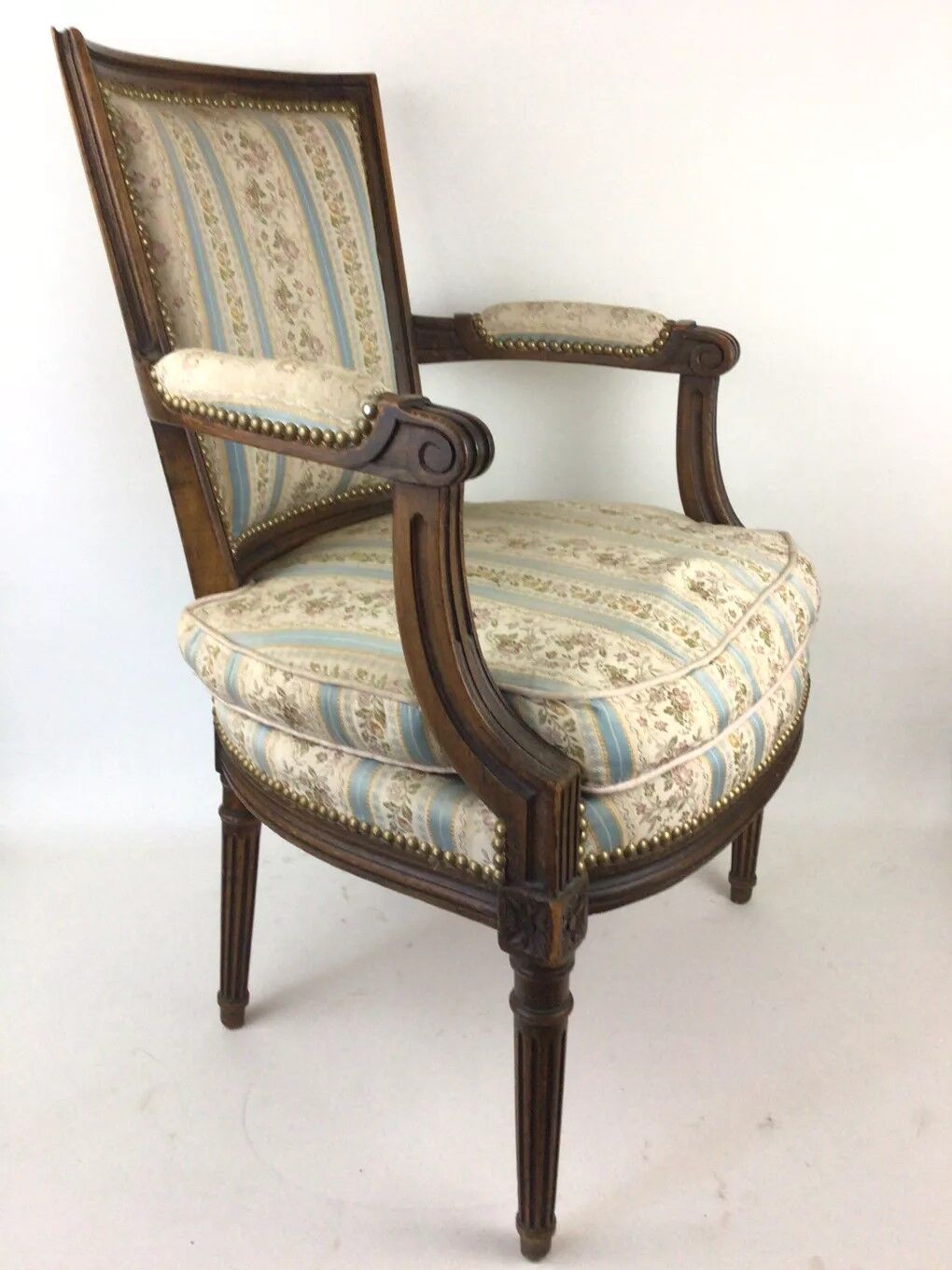 Pair of Louis XVI era convertible armchairs