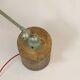 Jielde table lamp with 2 arms on a wooden base.