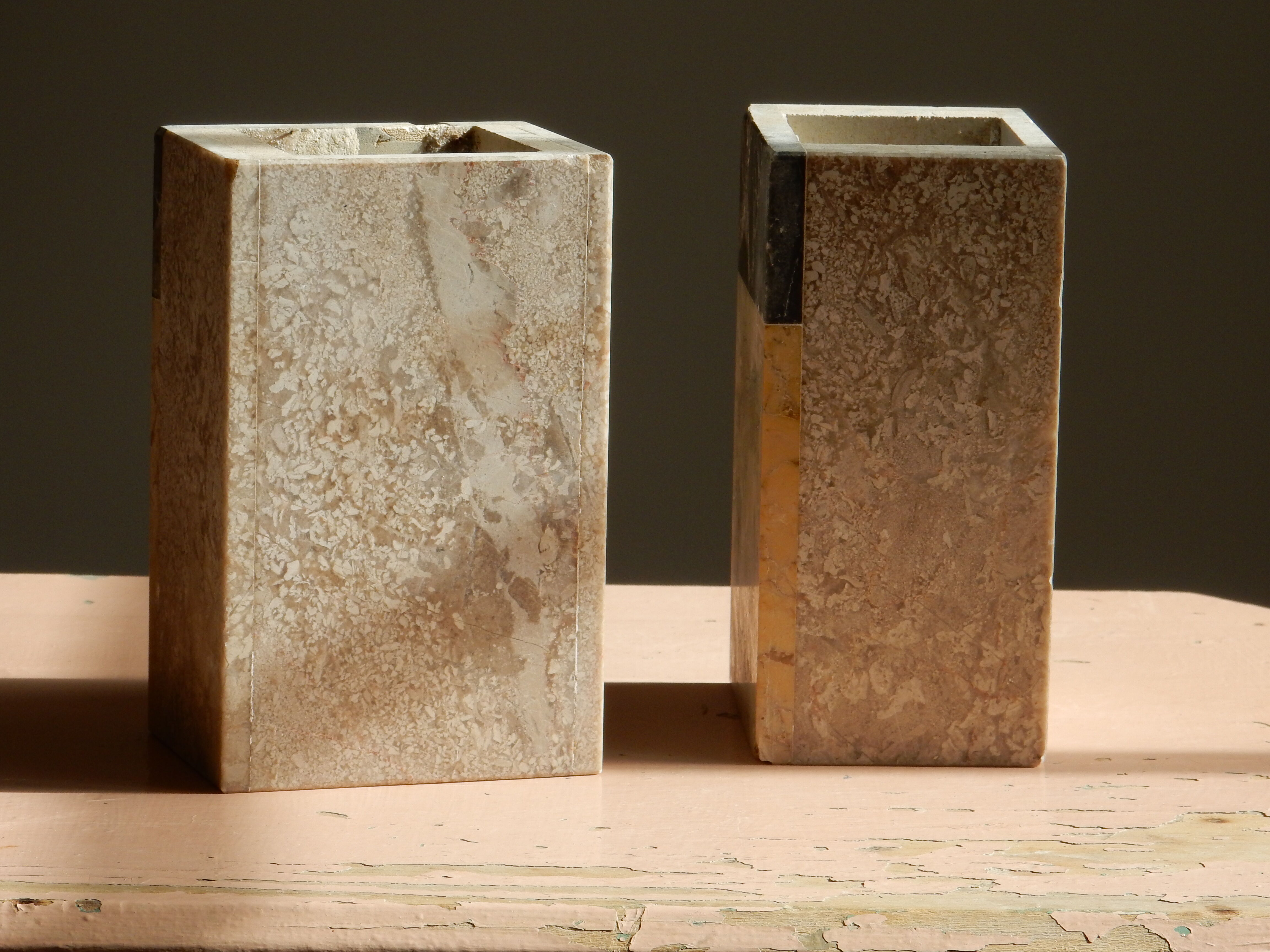Pair of travertine and granite vases Art Deco