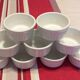 Lot of 9 pleated ramekins in white porcelain