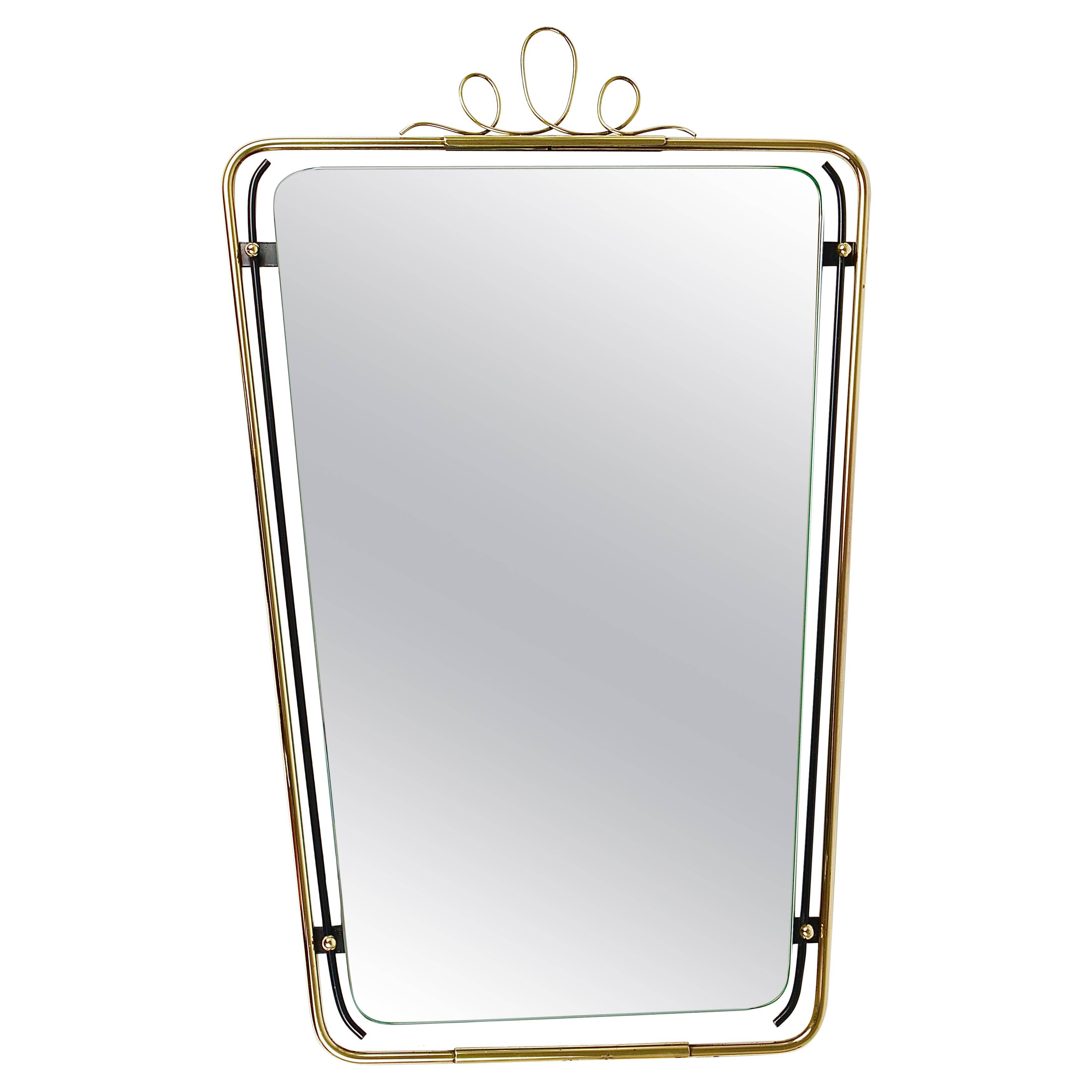 Wall mirror in brass wire with modernist loops from the mid-century, Italy, 1950s.