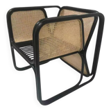 Armchair in black lacquered rattan and natural cane