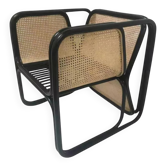 Armchair in black lacquered rattan and natural cane