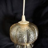 Small glass ball pendant light with amber plant effect