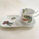 Tea cup, solitary service, naturalistic decoration, in Limoges porcelain.