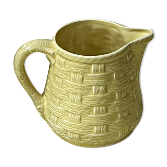 Yellow ceramic pitcher