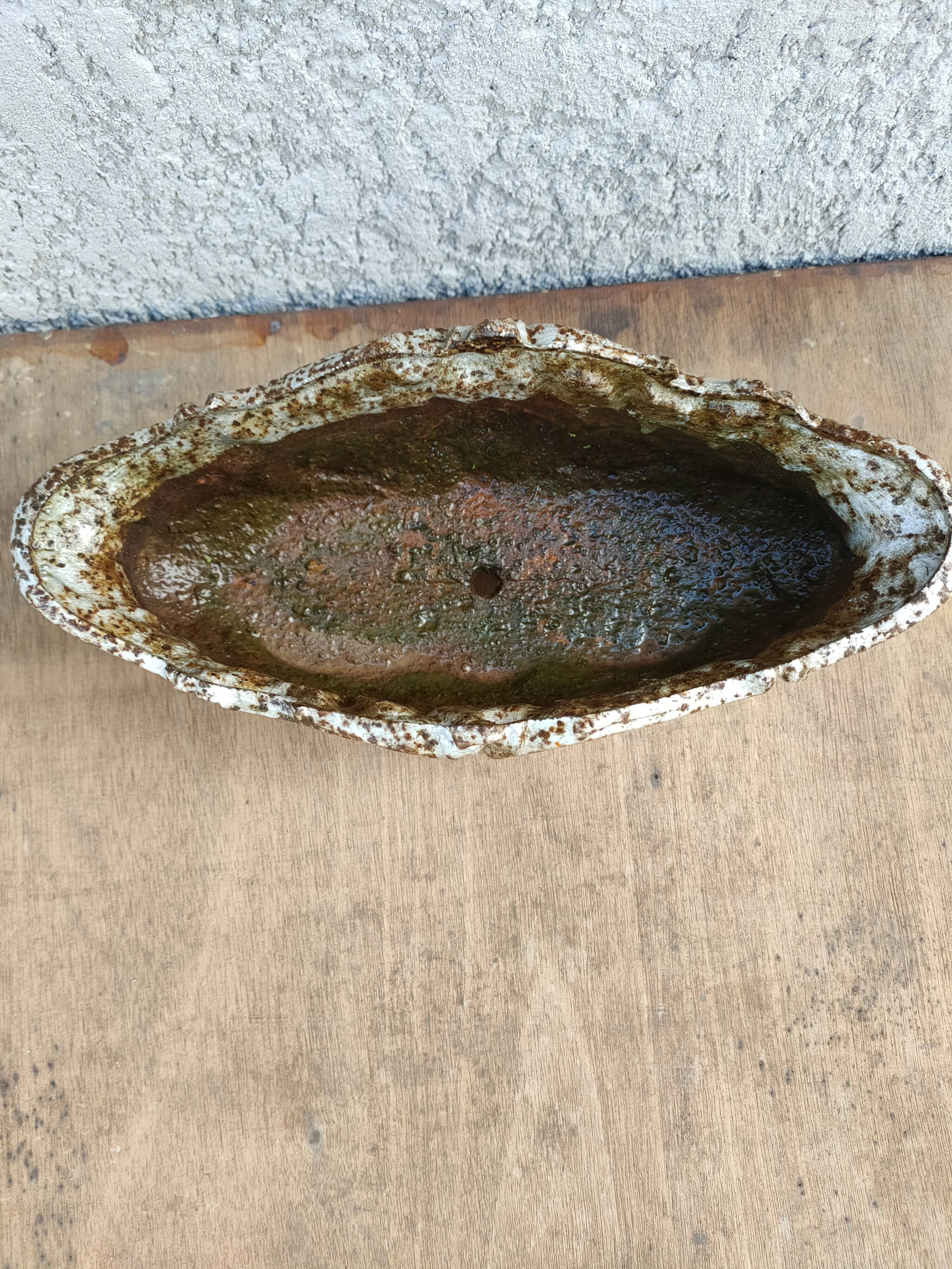 old cast iron planter