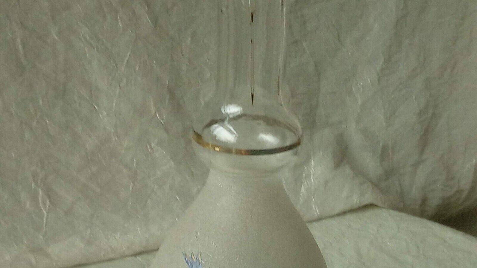 Lightly enameled granite glass carafe late 19th century