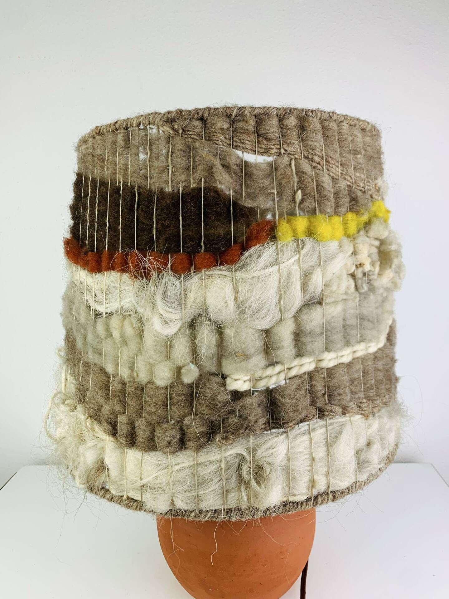 Terracotta globe lamp with a wool shade from the 1960s.