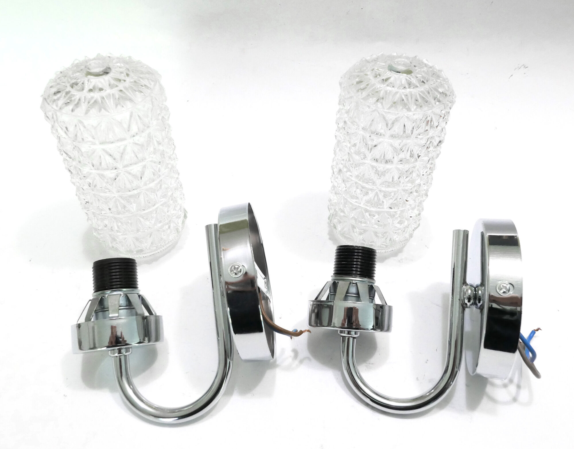 Pair of 1970 chrome metal wall light and molded glass globes.