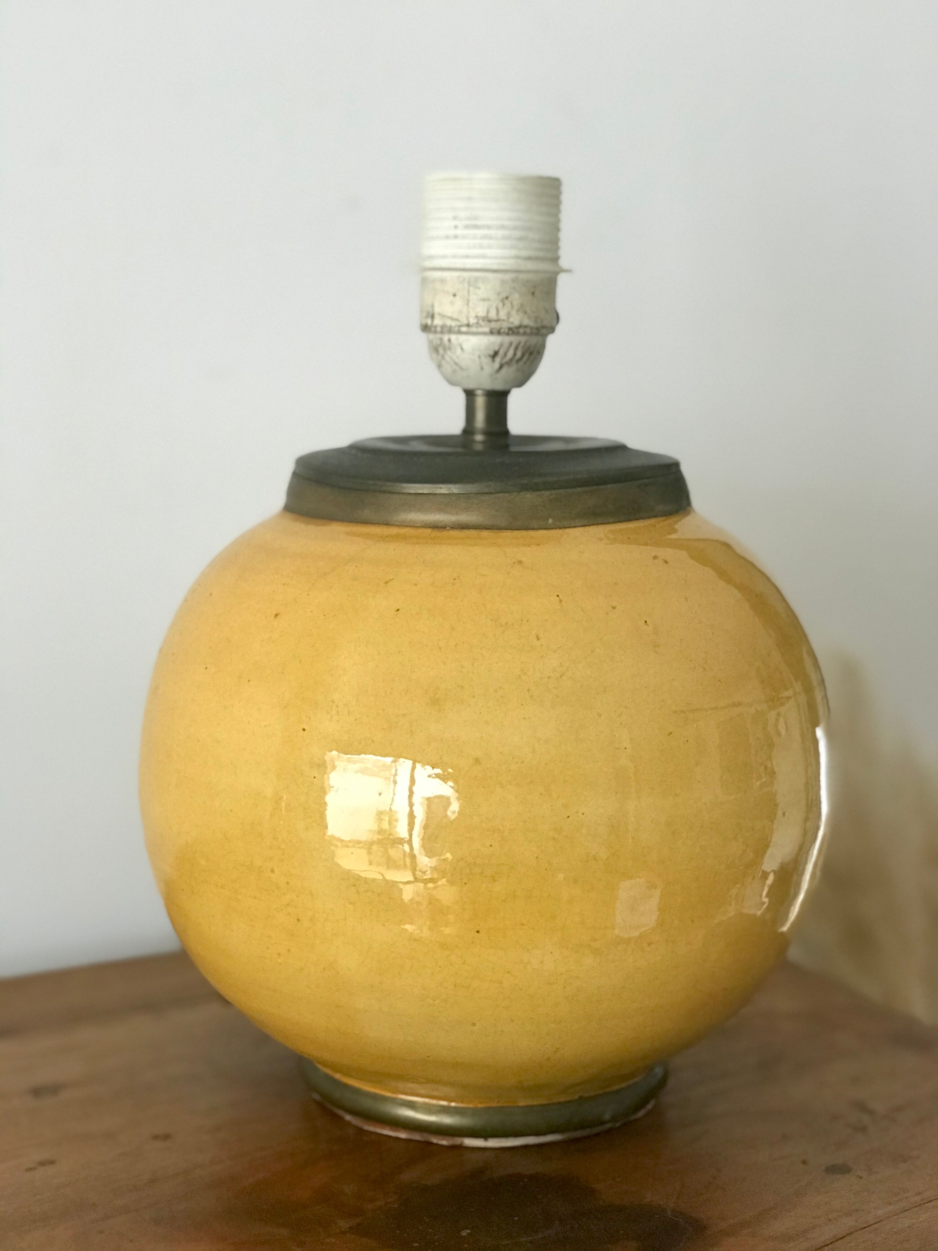 Ancient ceramic and brass lamp foot