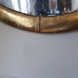Oval mirror with gold leaf