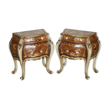 Pair of curved walnut commodes with marquetry and marble tops.