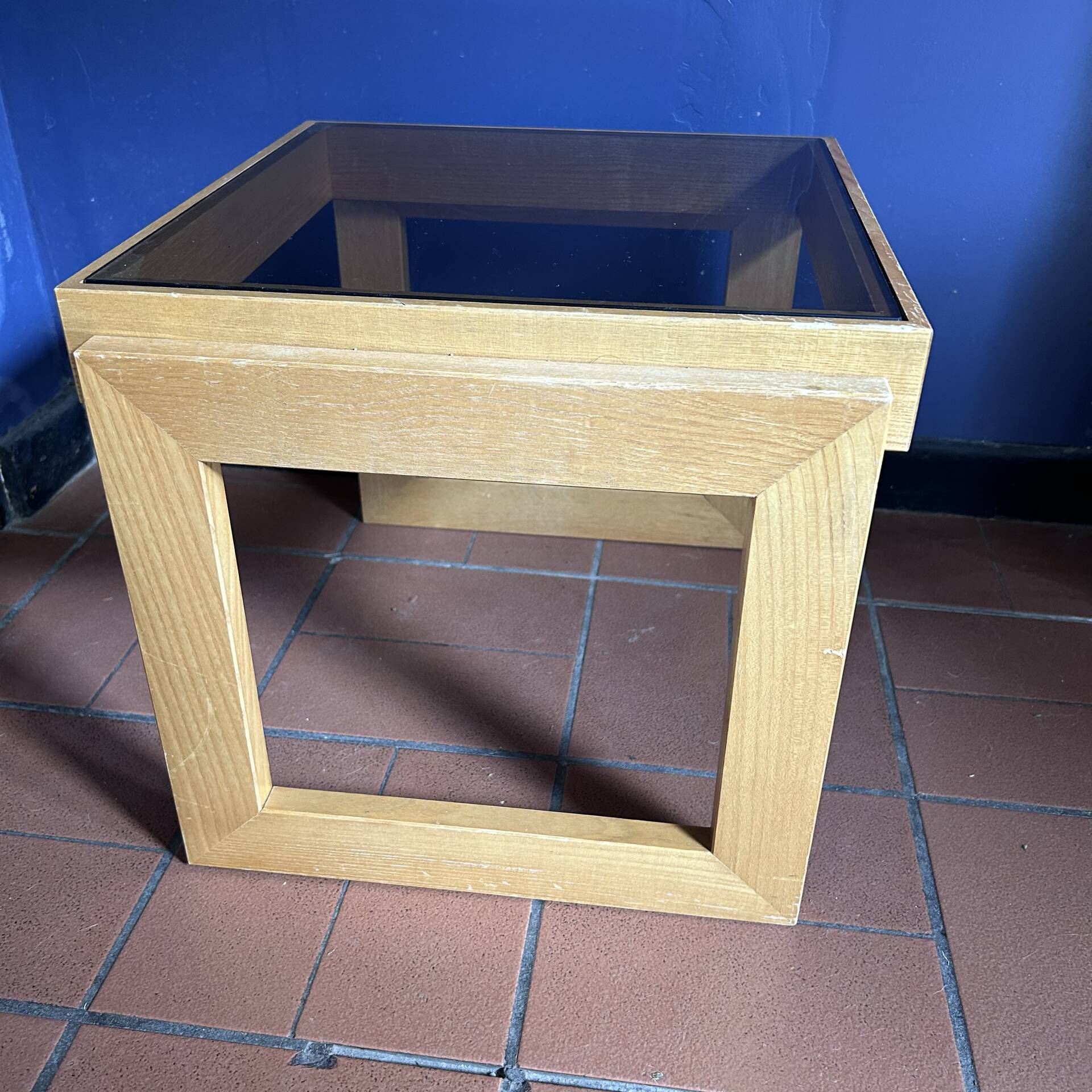 Modernist side table in wood and smoked glass