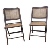 Vintage 2 folding chairs made of wood and cane.