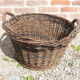 Old round wicker linen basket, dark rattan