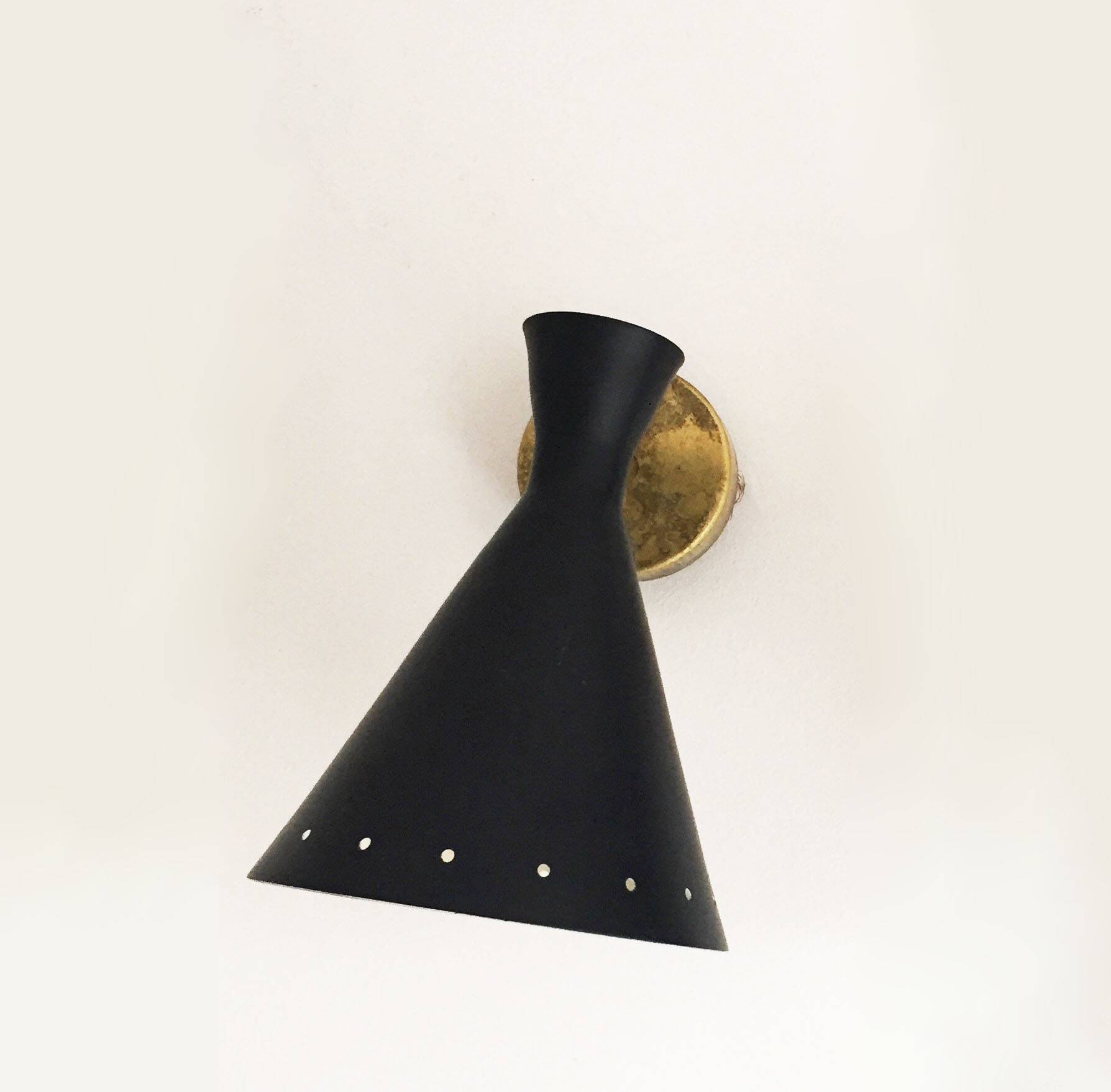 Set of three Italian wall lights in brass and lacquered iron, 1950s design.