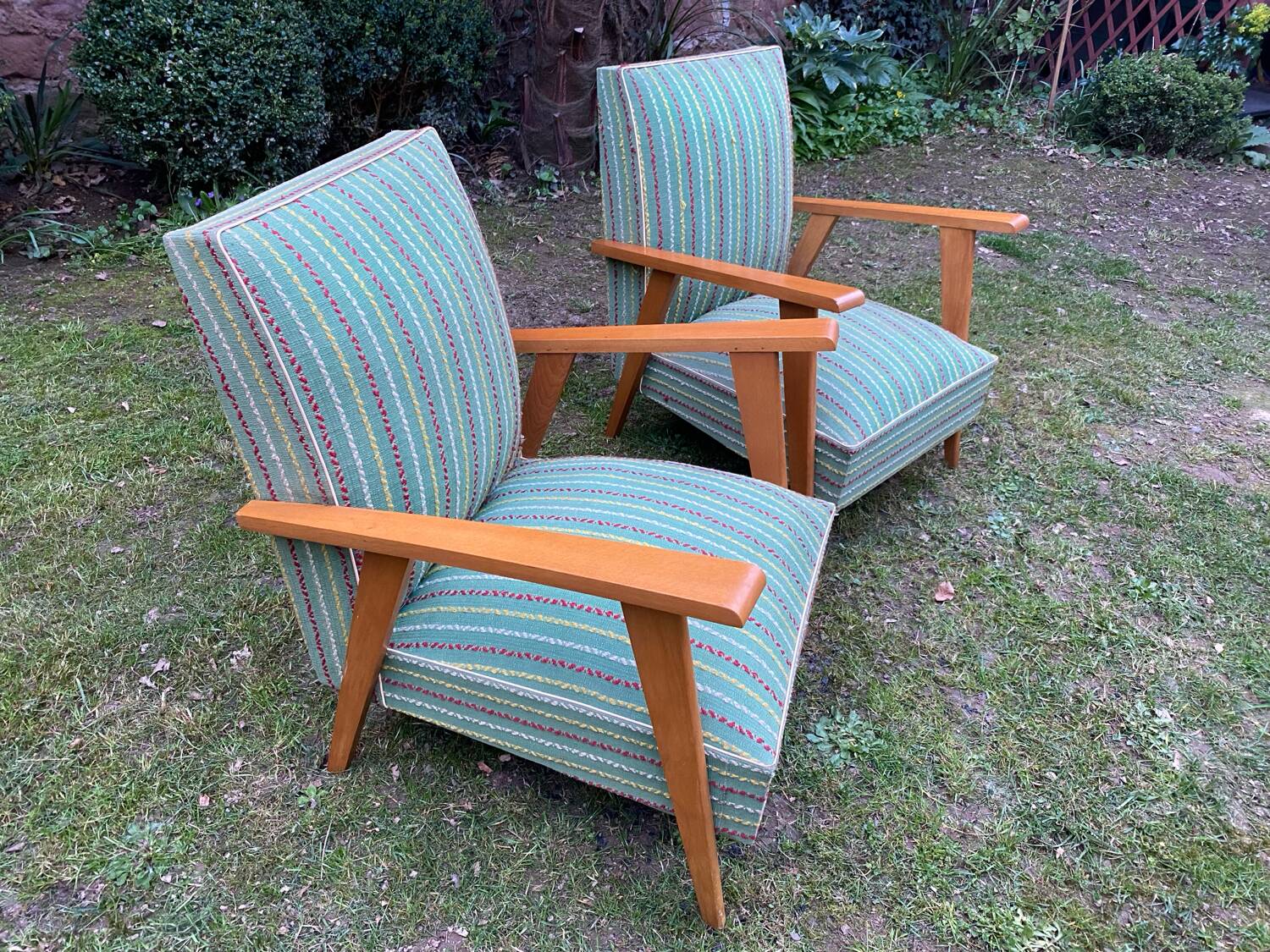 Pair of emerald green fabric armchairs circa 1950