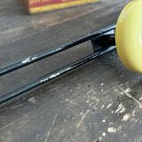 Wall coat rack with 4 vintage yellow metal hooks