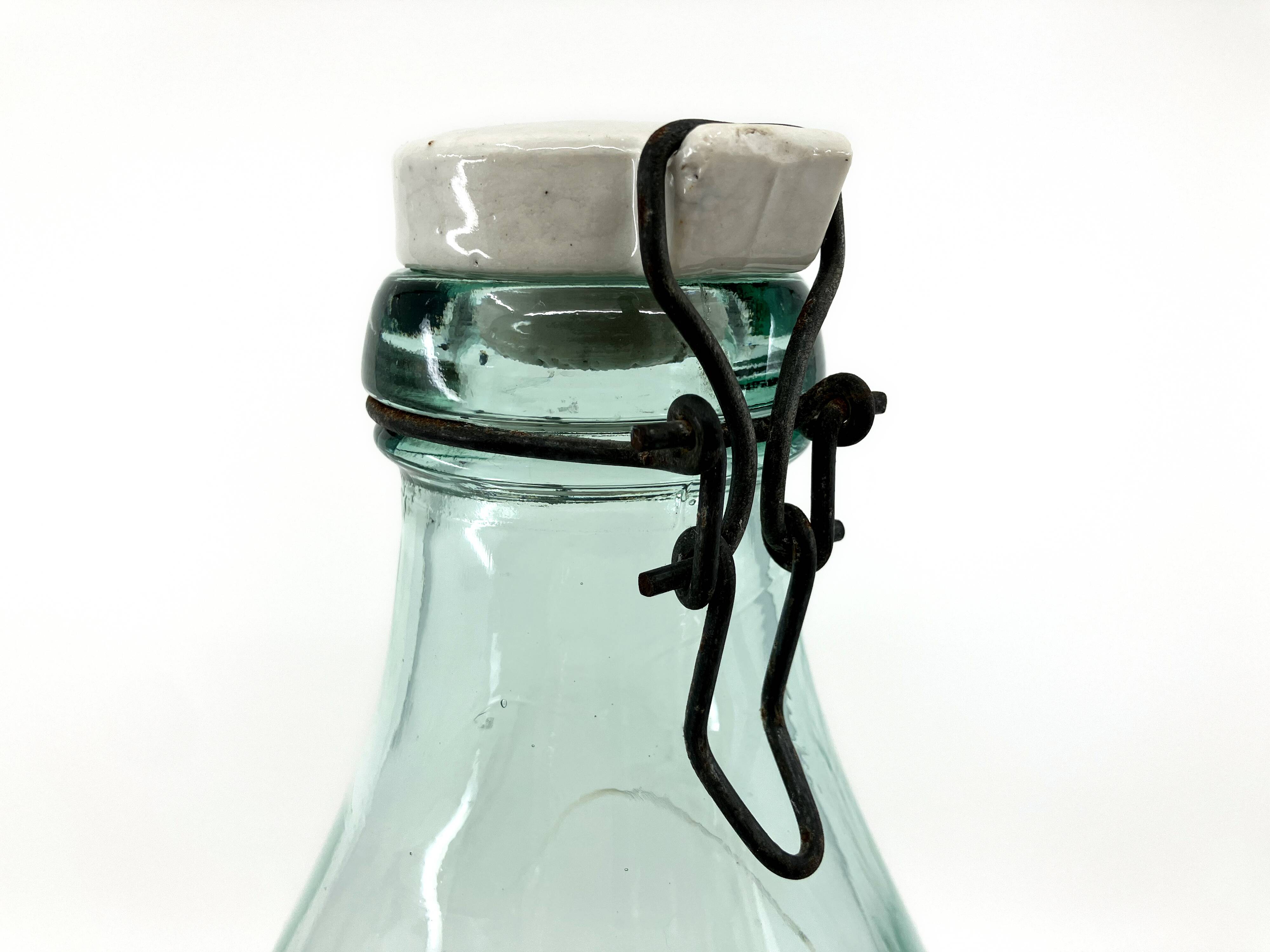 Large "Mercur" glass bottle with ceramic stopper • 2L • 1930
