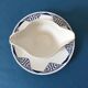 Porcelain gravy boat stamped Moulin des Loups & Hamage - Orchies. “Puppet” model