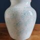 White Ceramic Vase with Peach and Leaf Motifs