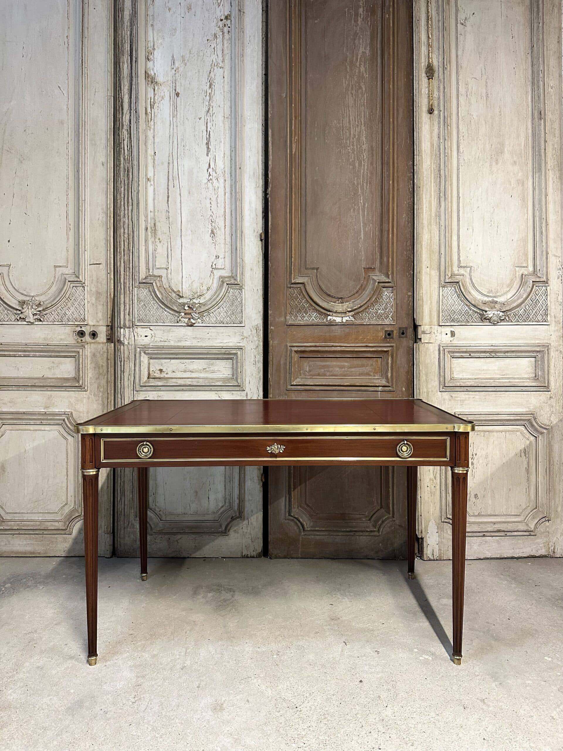 Louis XVI style flat desk in mahogany from around 1950.