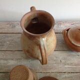 Teapot in reeds and its sugar bowl