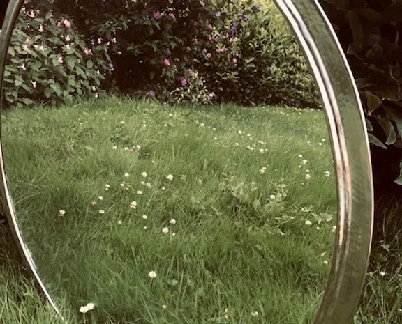 Hammered metal round mirror