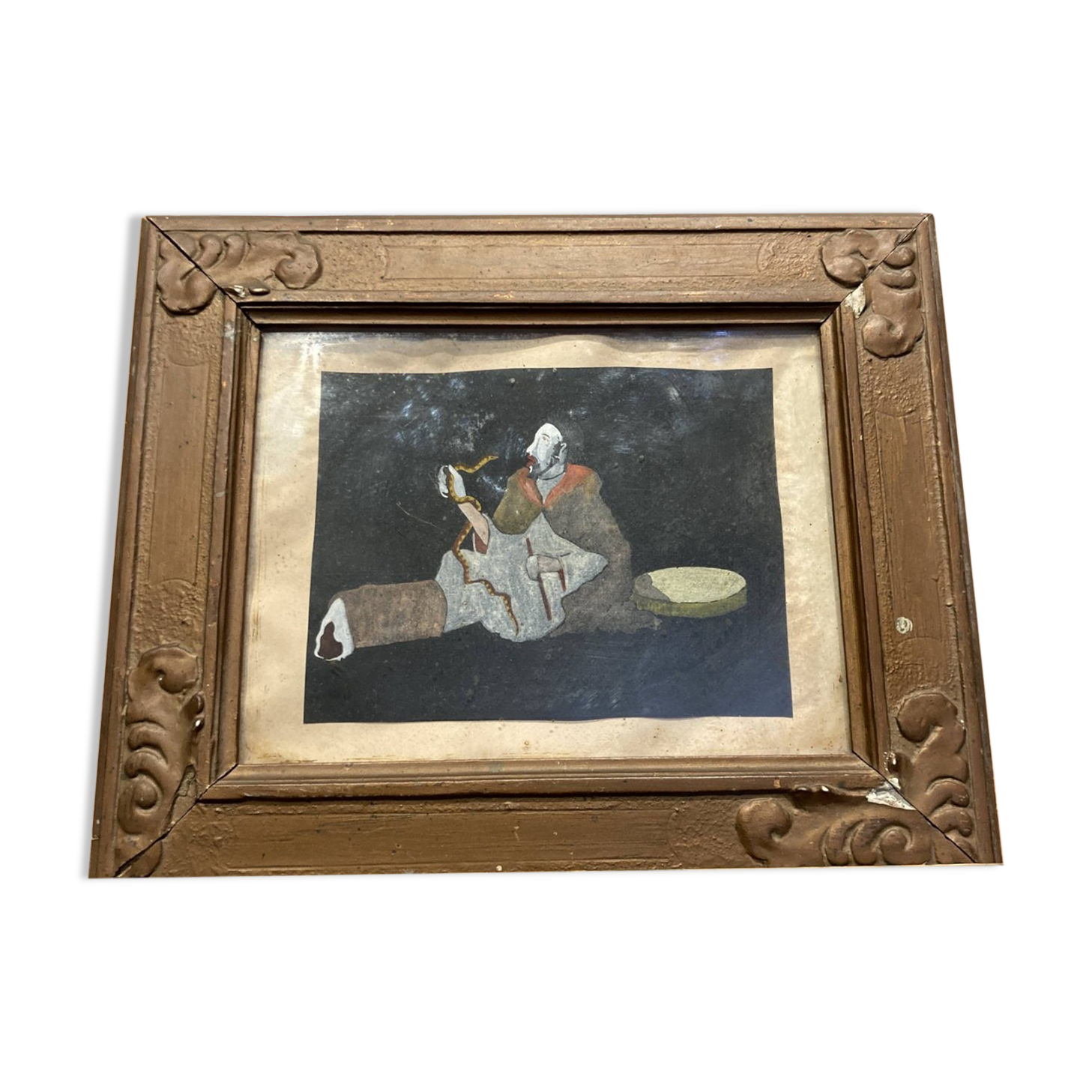 Framed painting of a man on mica.