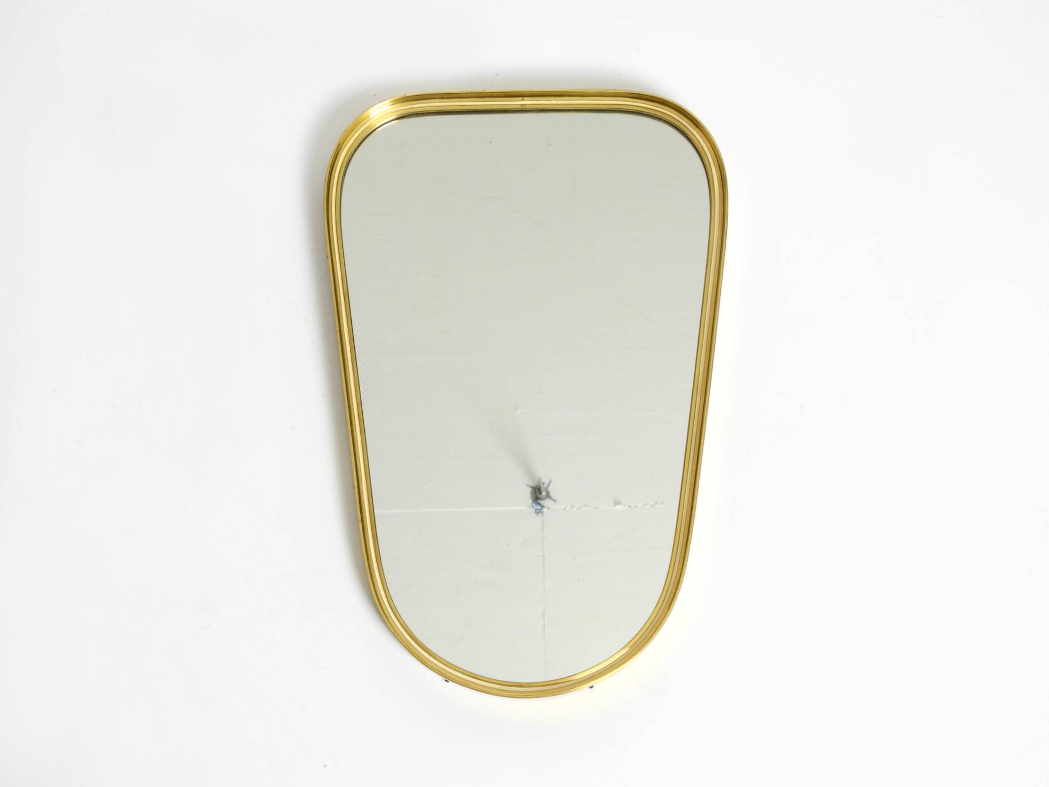 Small solid Mid Century brass wall mirror by Münchener Zierspiegel