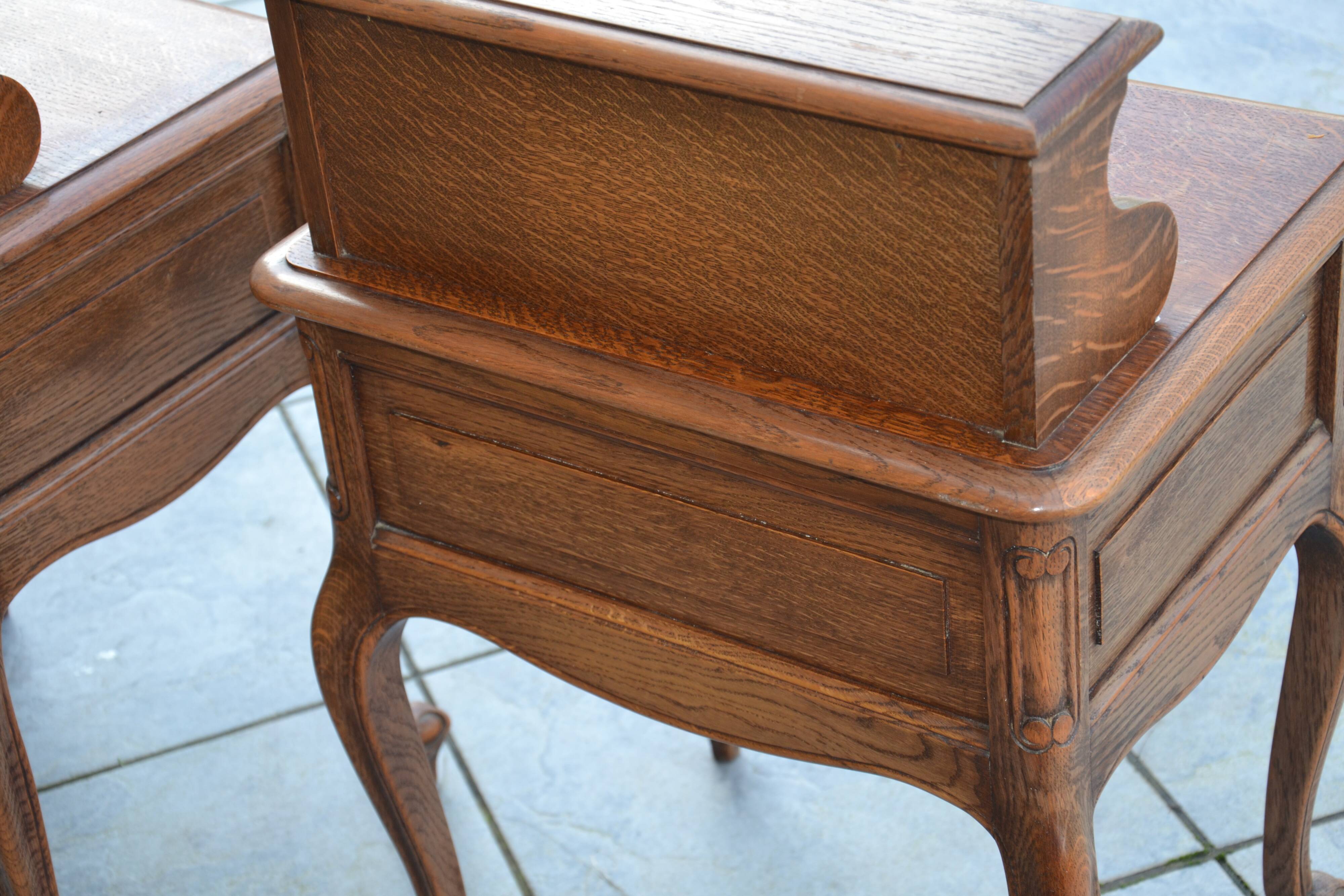 Two oak bedside tables.
