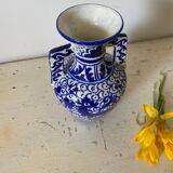 Small amphora vase in old hand-painted ceramic