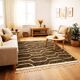 Green Boujad rug with a hexagonal pattern.
