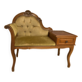 Telephone cabinet with seat