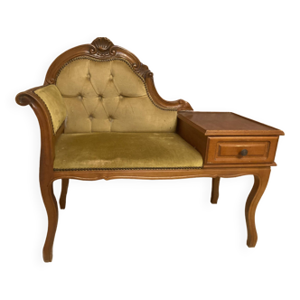 Telephone cabinet with seat