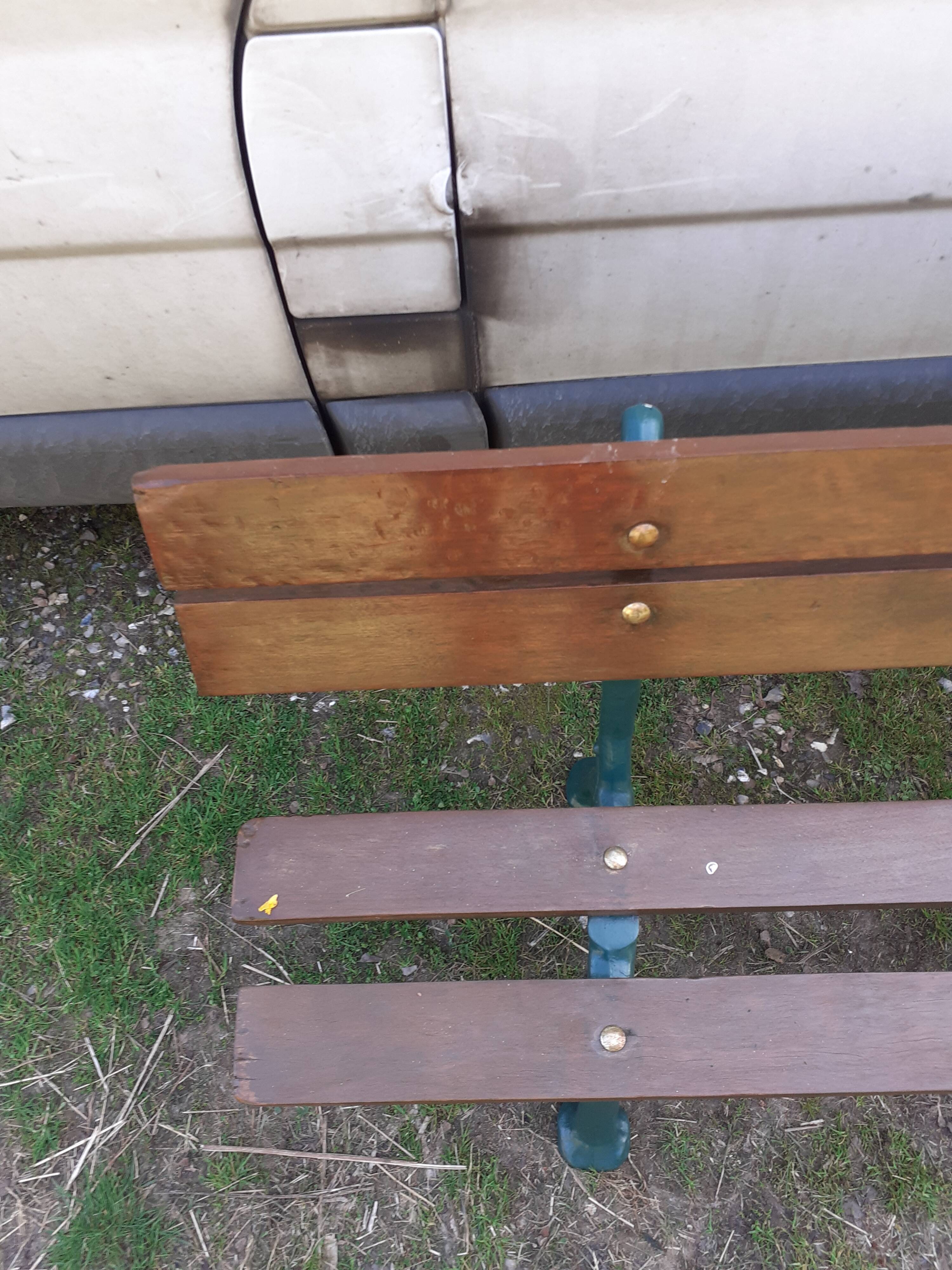 Old garden bench with cast iron feet