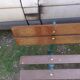 Old garden bench with cast iron feet