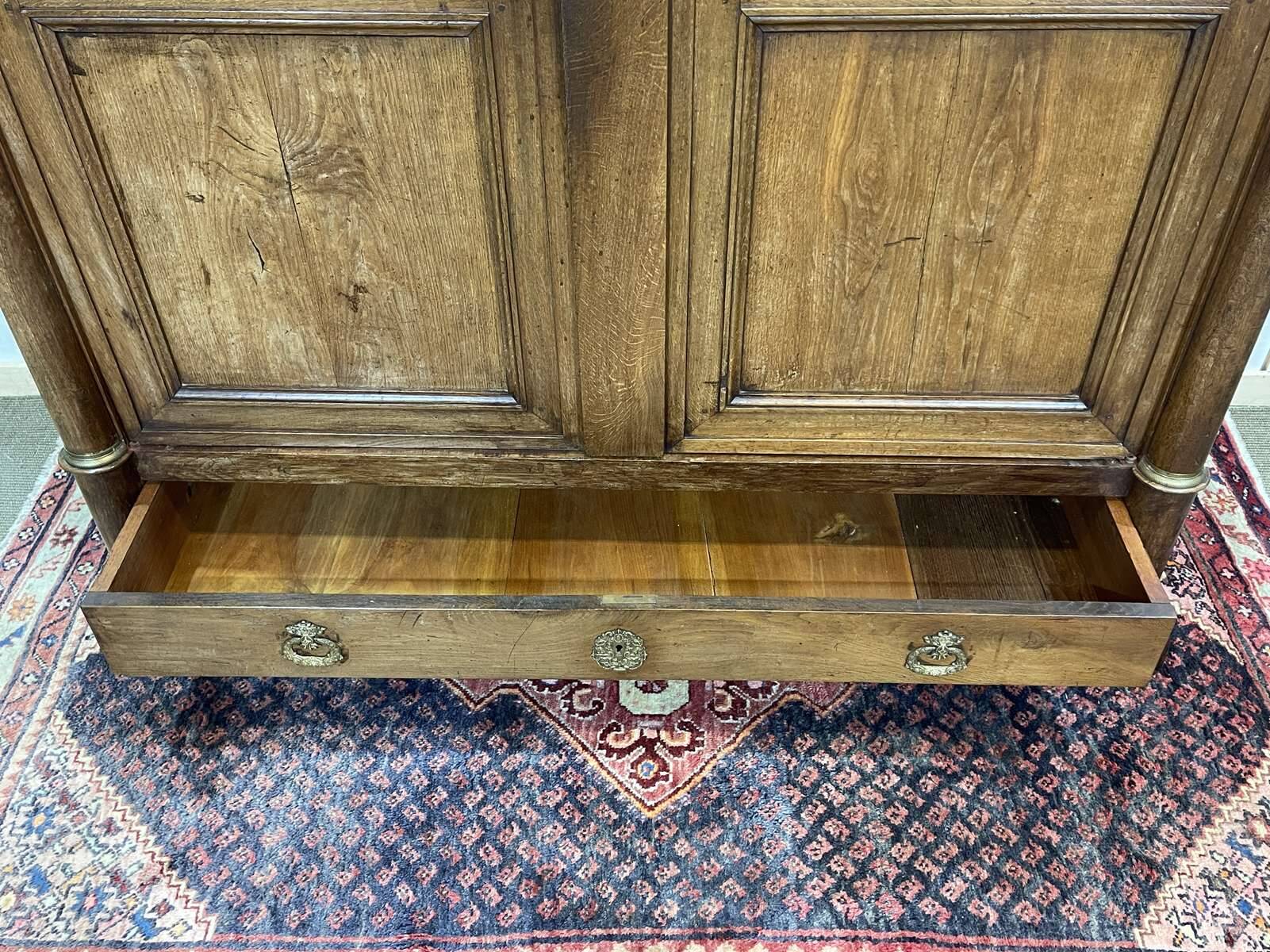 Empire wardrobe from the early 19th century in oak.