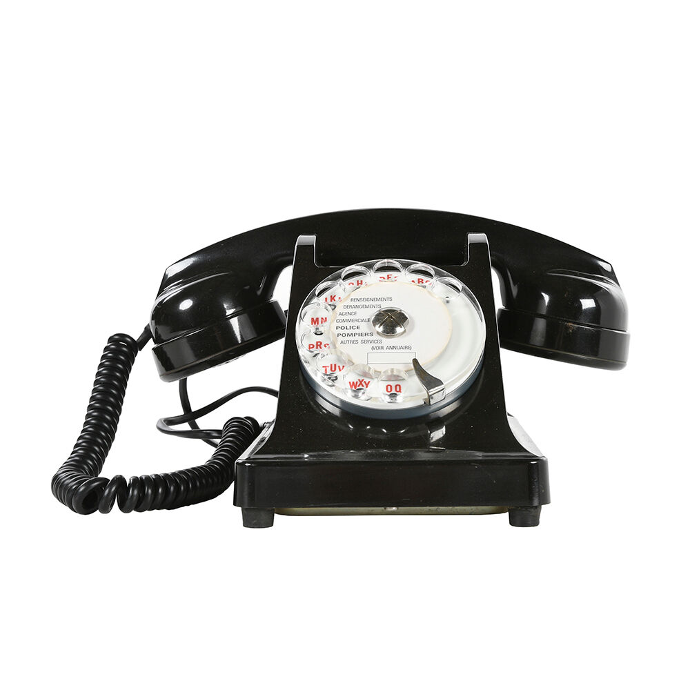 Ancien téléphone en bakélite noire des années 1940
