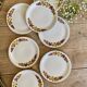 Set of 7 vintage dessert plates