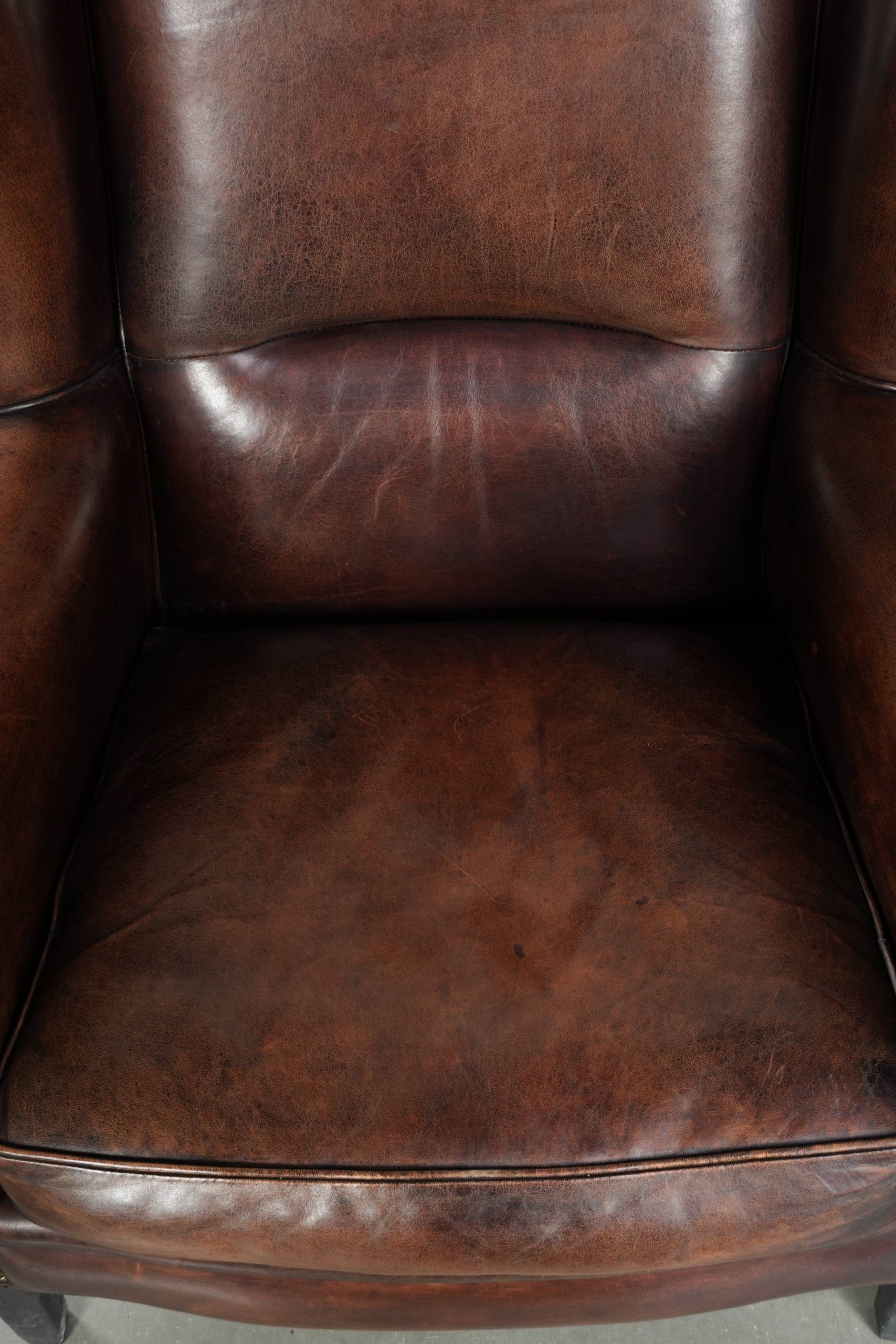 Sheepskin wingback armchair with beautiful deep and warm colours