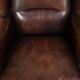 Sheepskin wingback armchair with beautiful deep and warm colours