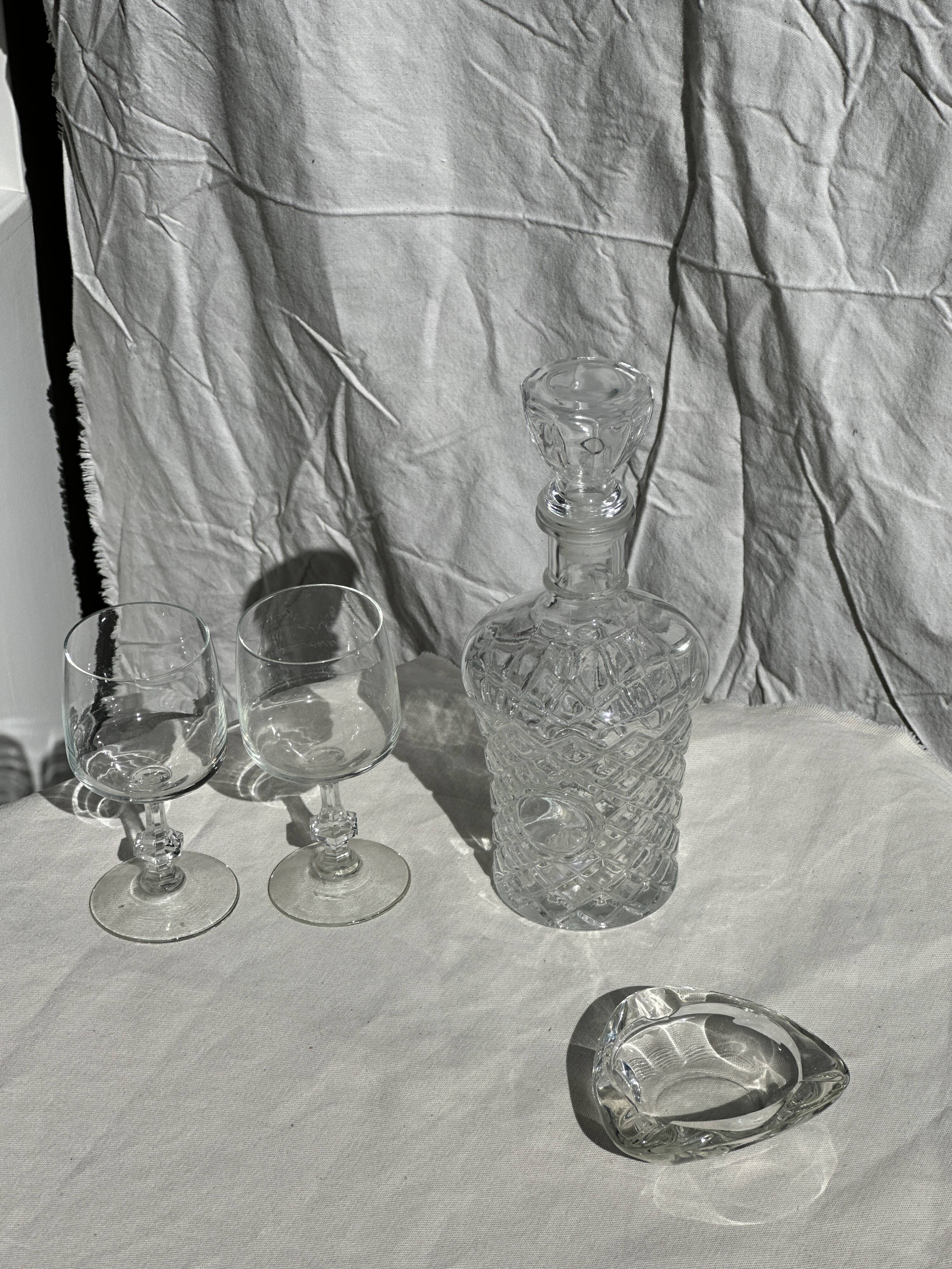 Small cylindrical glass whiskey decanter H:23