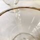 Trio of glass dessert bowls with gold rims, La Rochère, France
