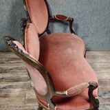 Very large Louis XV style mahogany banquette with medallions from the 19th century.
