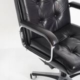 Vintage leather armchair. Swivel, on casters, multi-position. Norway, 1970s.